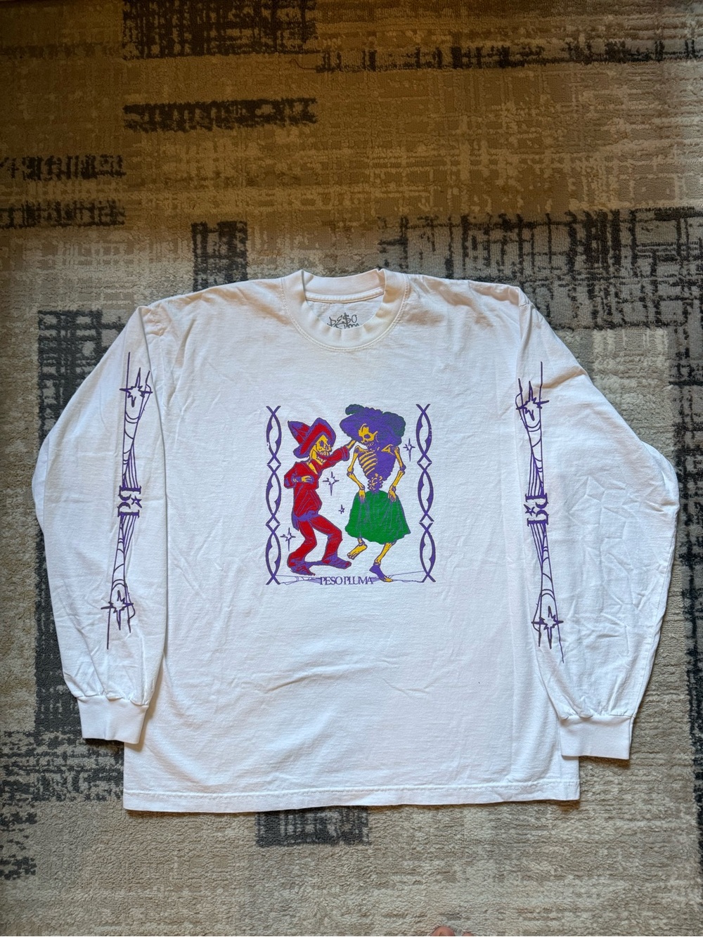 Peso Pluma White Long Sleeve Graphic Tee with Colorful Skeleton Dance Print